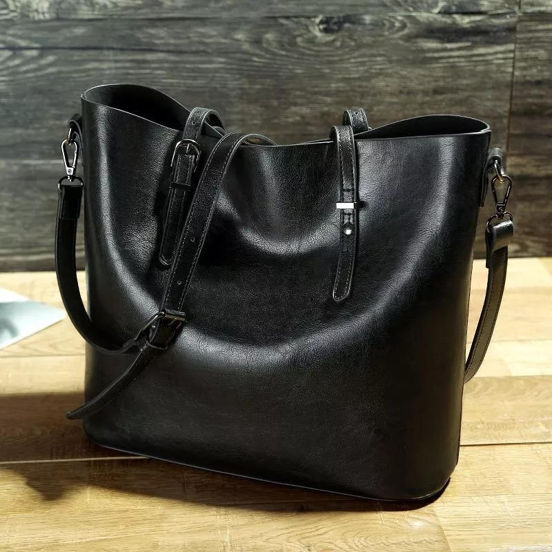 Women's vintage PU leather tote bag in rich brown with retro charm, spacious design for everyday use