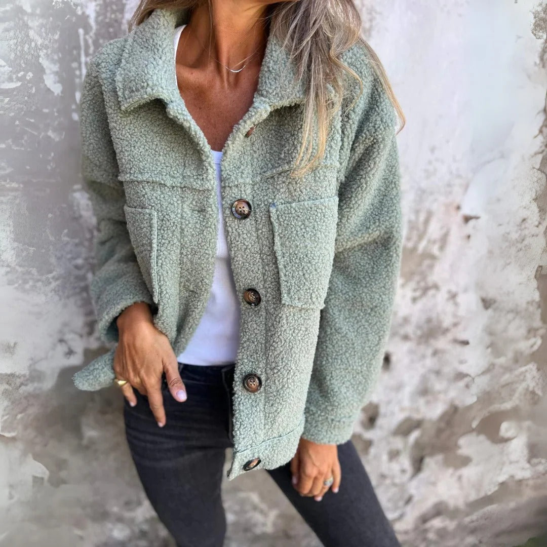 Women's relaxed fit wool coat wide lapel oversized buttons patch pockets cozy elegant outerwear