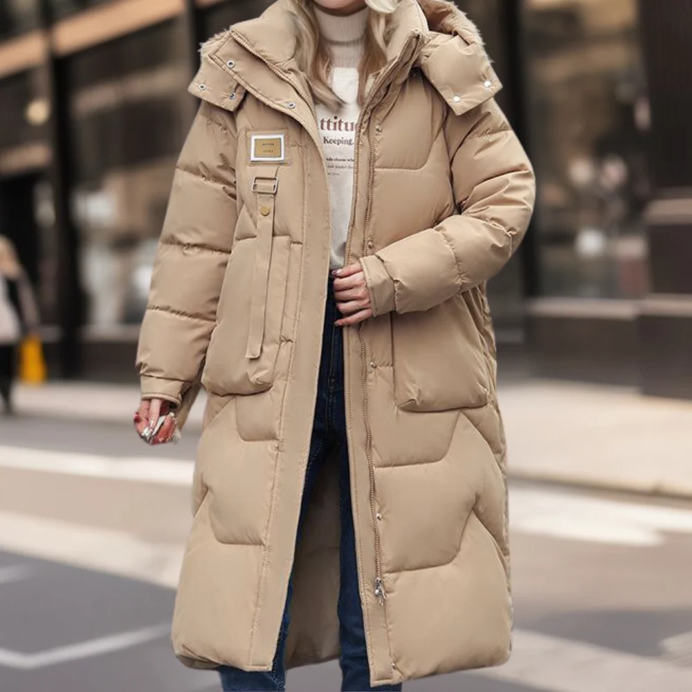 Women's oversized full-length quilted coat with hood, water-resistant, cozy winter fashion staple