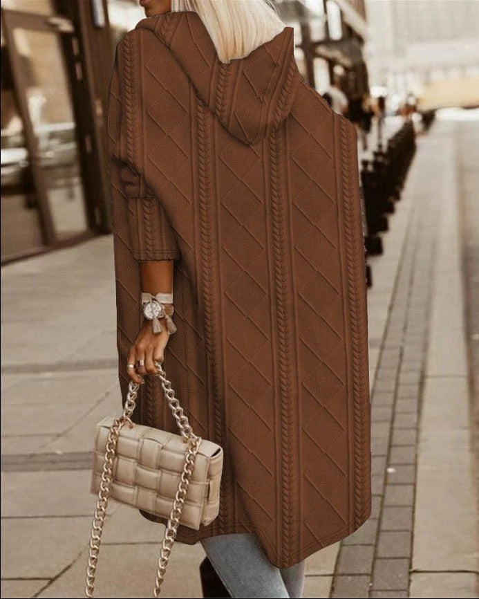 Women's oversized longline hooded cable knit cardigan in neutral wool blend for casual layering