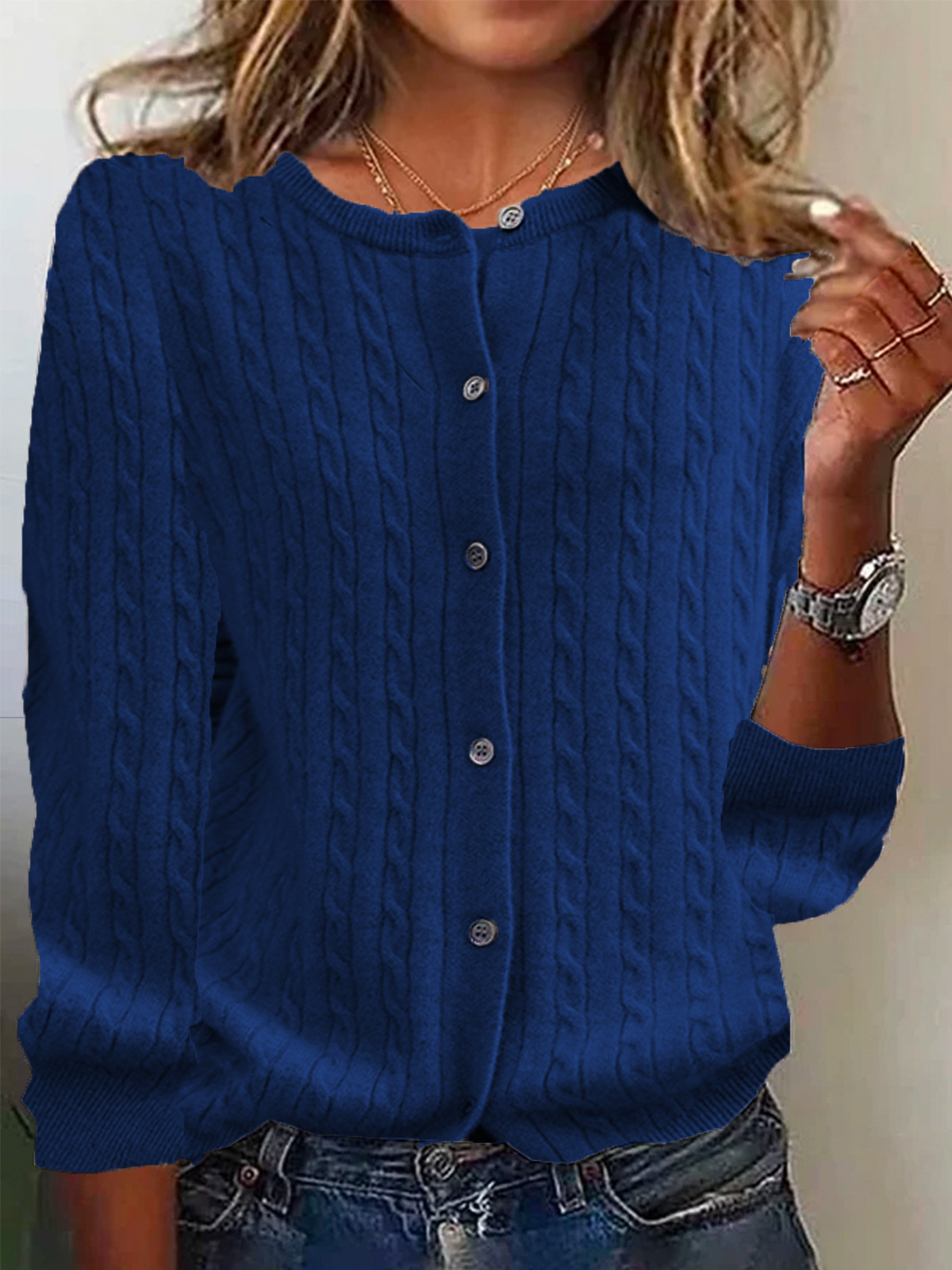 Women's cream cable knit wool cardigan, relaxed fit with button front closure and long sleeves