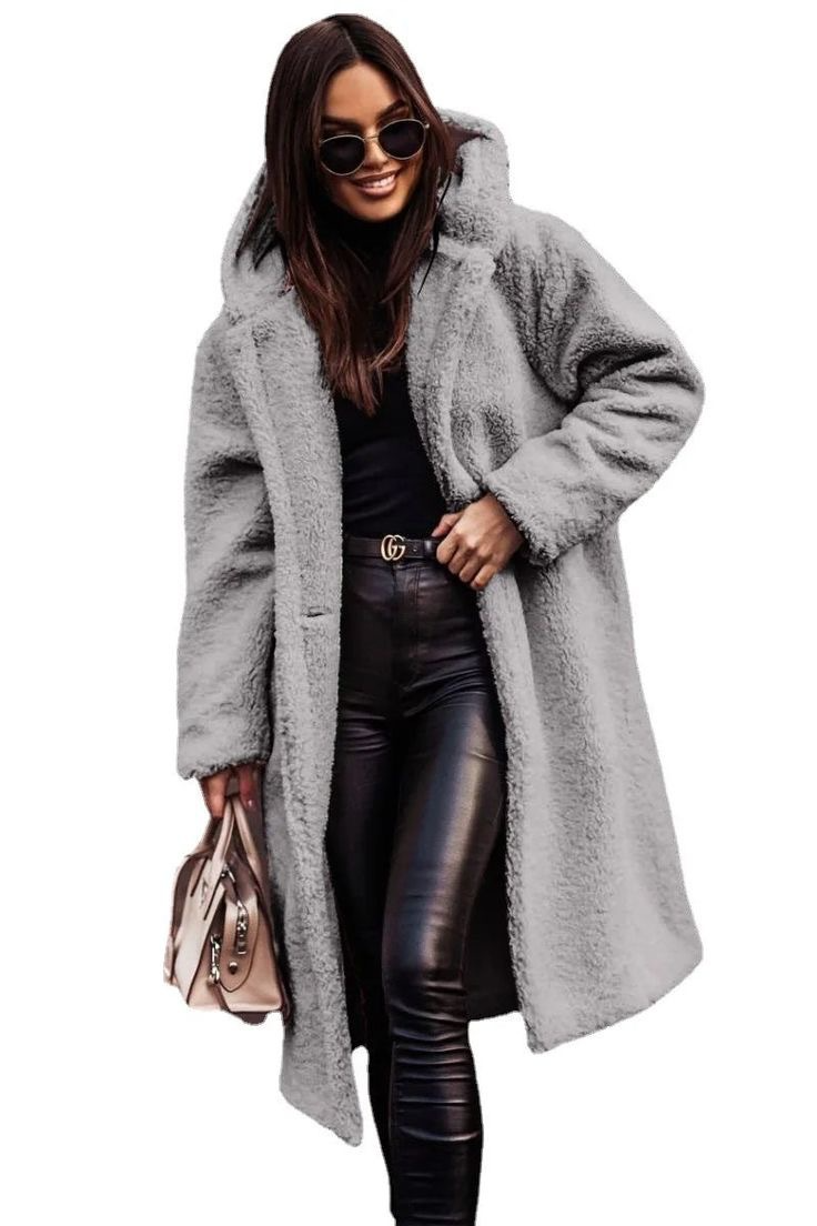 Women's oversized mid-length faux fur coat open front plush texture cozy winter luxury style