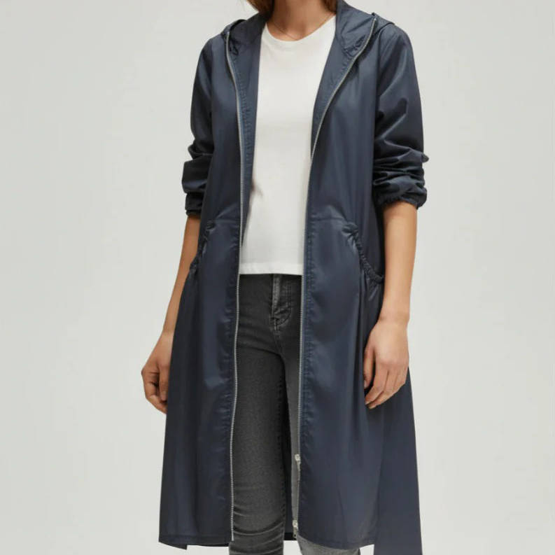 Women's long waterproof jacket neutral tone relaxed fit with sealed seams for all-day rain protection