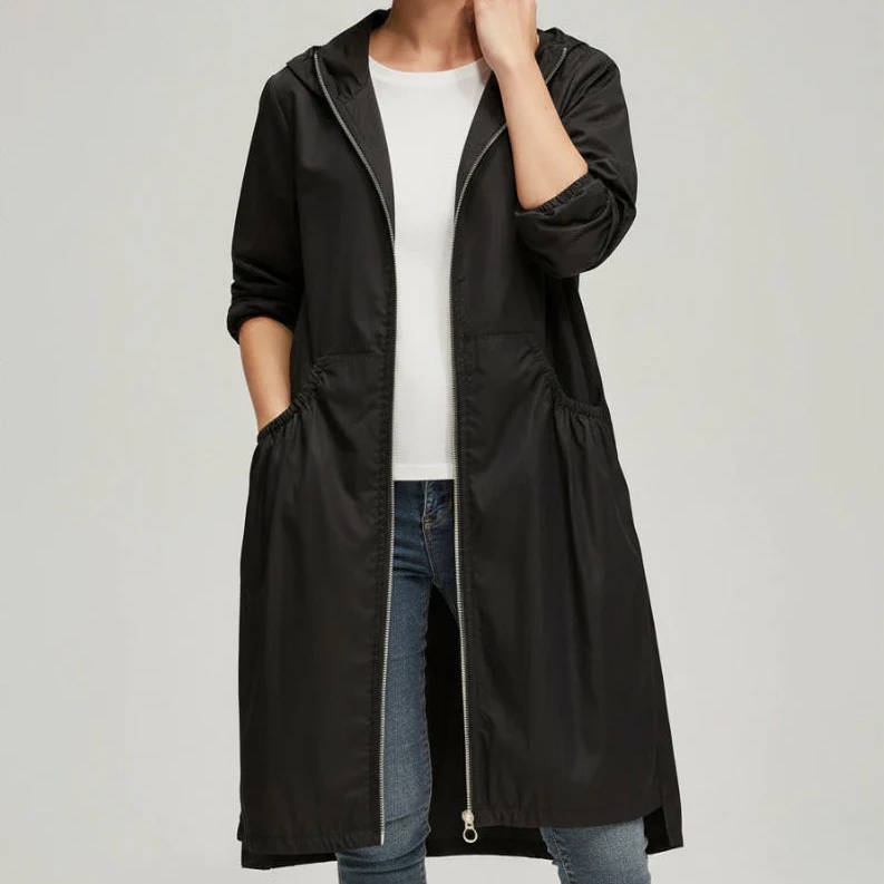 Women's long waterproof jacket neutral tone relaxed fit with sealed seams for all-day rain protection