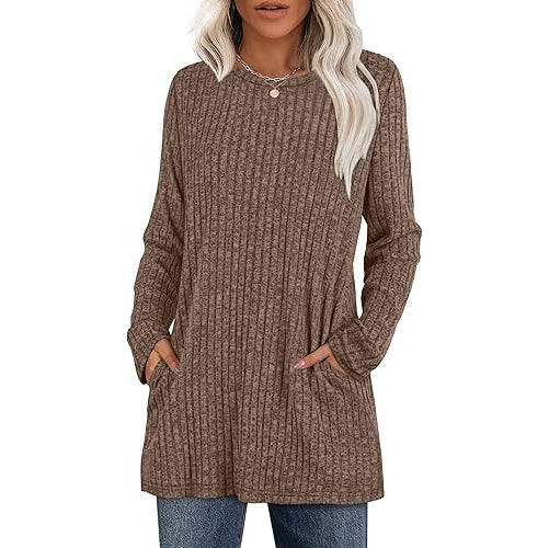 Women's casual hip-length tunic sweater in neutral stretch knit with convenient side pockets