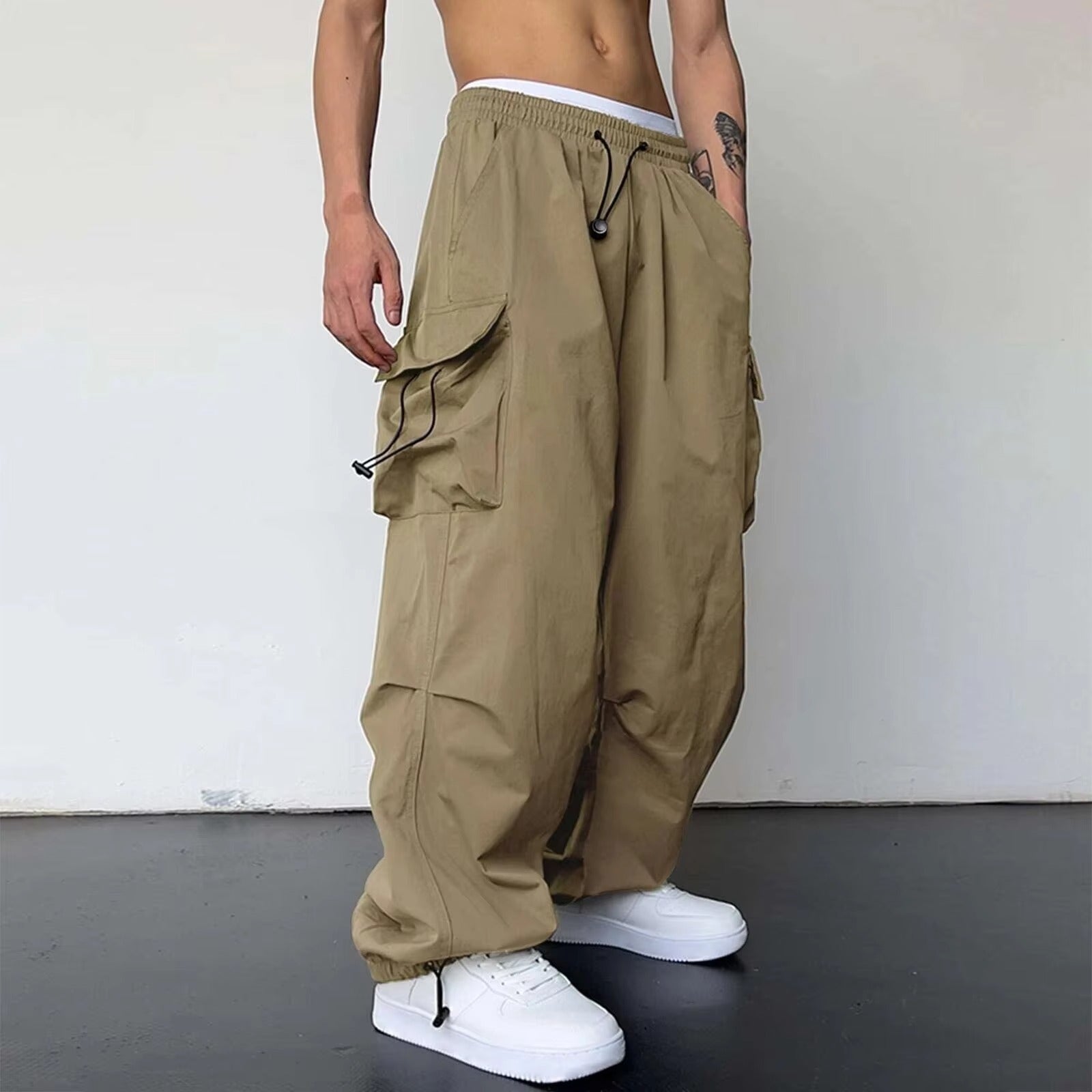 Men's baggy cargo pants wide leg relaxed fit large side pockets drawstring waist streetwear style