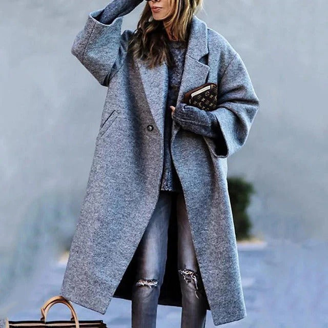 Women's long plaid wool blend winter coat with button front and deep side pockets for work and evening