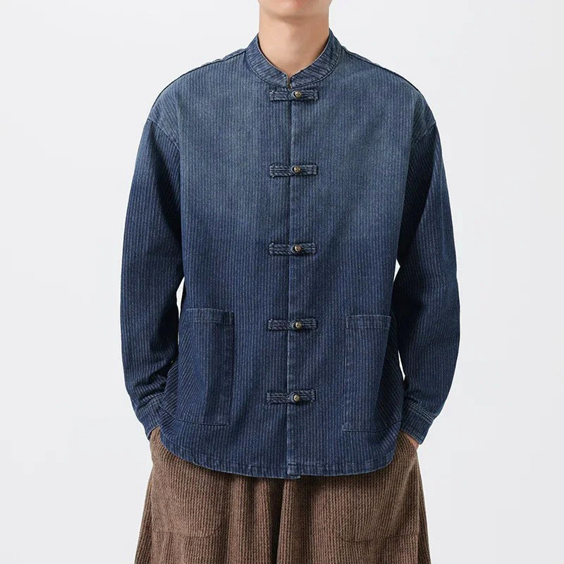Relaxed blue pinstripe denim overshirt with Tang silhouette, pankou knot closures and engraved buttons