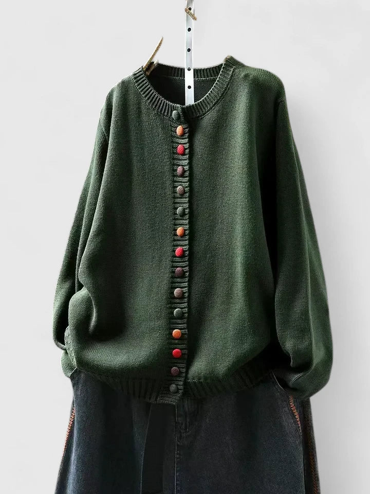 Soft relaxed-fit cardigan in neutral tones with breathable fabric and effortless layering silhouette