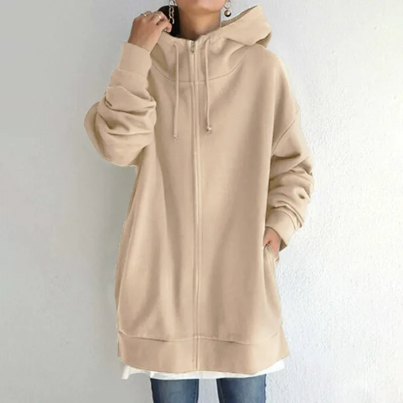 Women's oversized fleece zip-up hoodie in cozy relaxed fit with functional side pockets