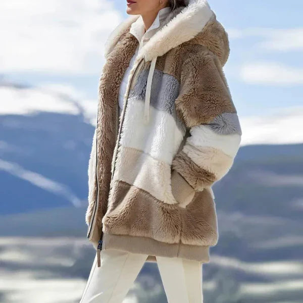 Women's oversized hooded jacket with plush faux fur lining, cozy city-style coat for cool weather