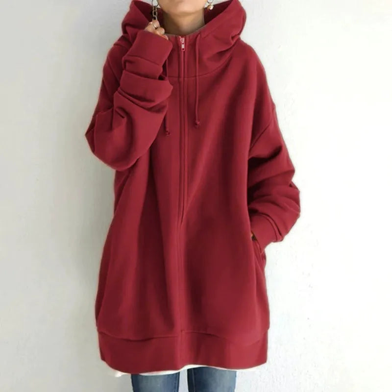 Women's oversized fleece zip-up hoodie in cozy relaxed fit with side pockets for everyday comfort
