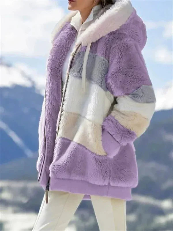 Women's oversized hooded jacket with plush faux fur lining, cozy city-style coat for cool weather