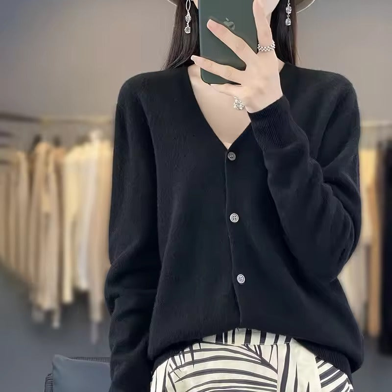 Women's relaxed fit wool blend V-neck sweater with button front closure and long sleeves