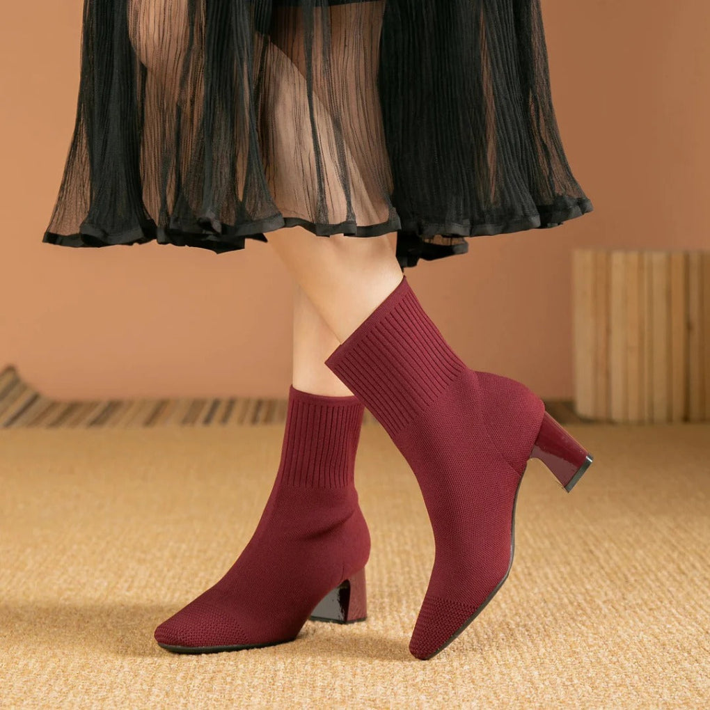 Women's ribbed knit ankle boots in winter tones with stretchy textured upper and sleek silhouette