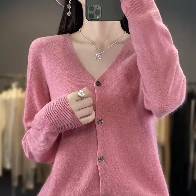 Women's relaxed fit wool blend V-neck sweater with button front closure and long sleeves