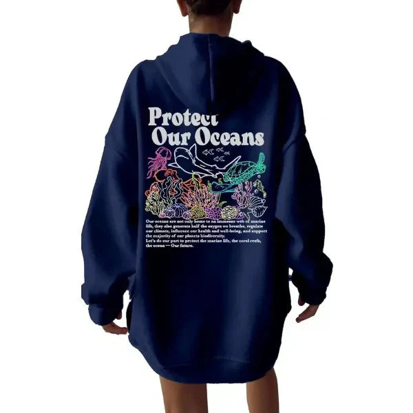 Women's oversized gray hoodie sweatshirt with bold marine graphic back print, casual street style
