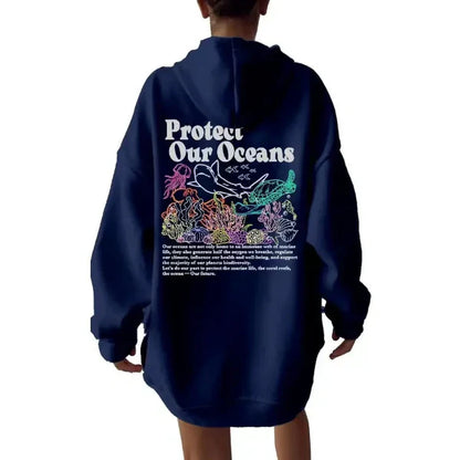 Women's oversized gray hoodie sweatshirt with bold marine graphic back print, casual street style
