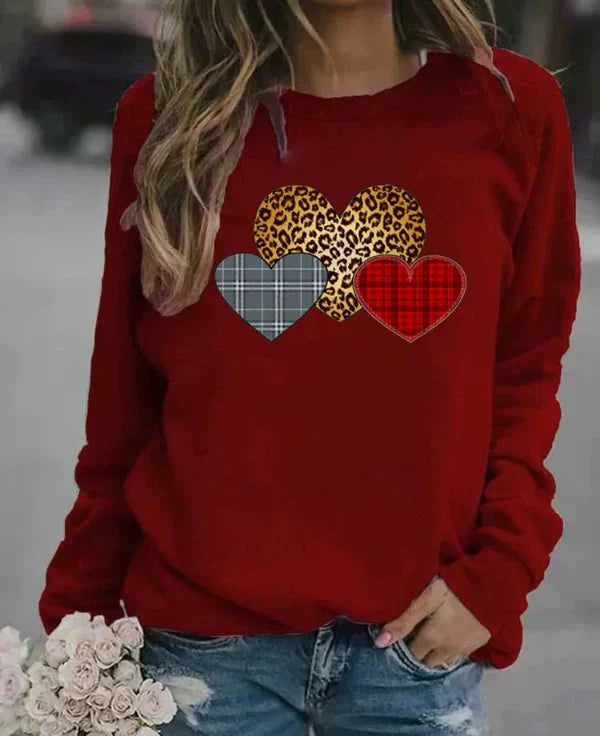 Women's grey loose fit cotton blend crew neck sweatshirt with playful graphic heart print