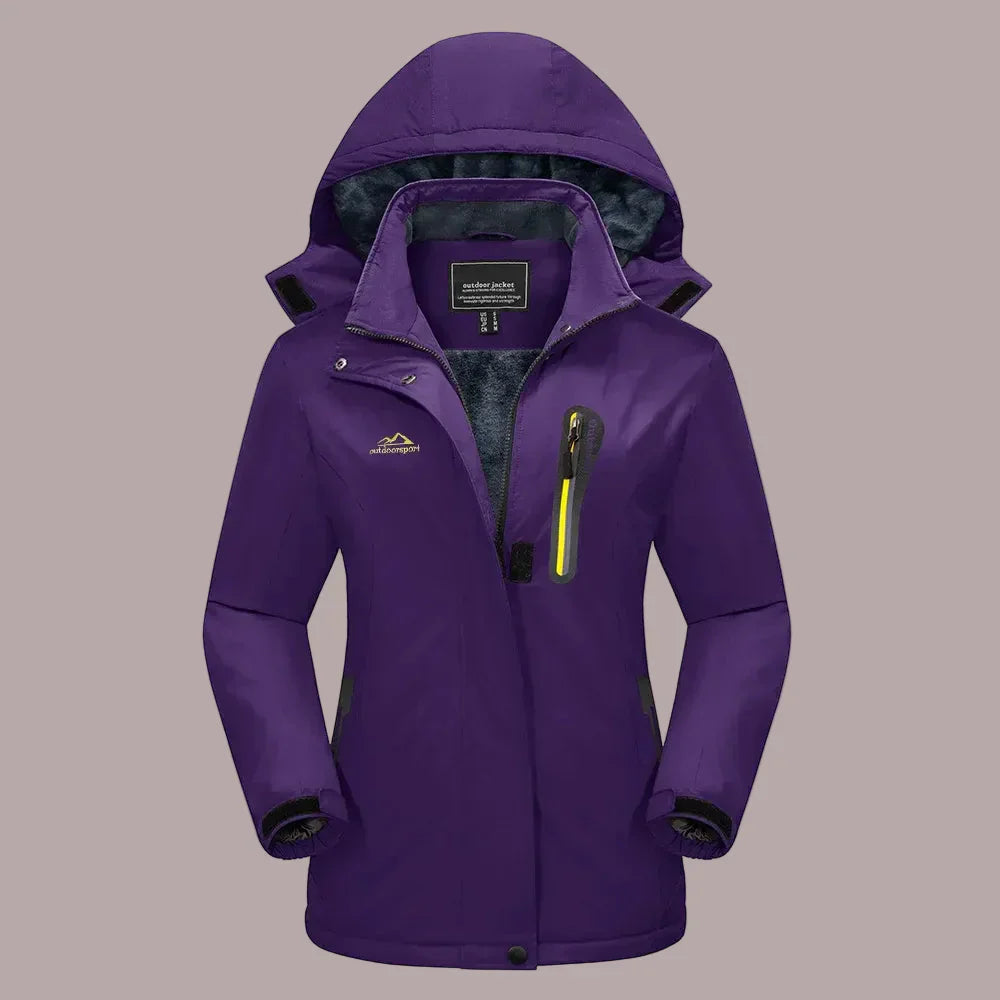 Women's water-resistant fleece-lined outdoor jacket with adjustable hood, built for hiking and travel