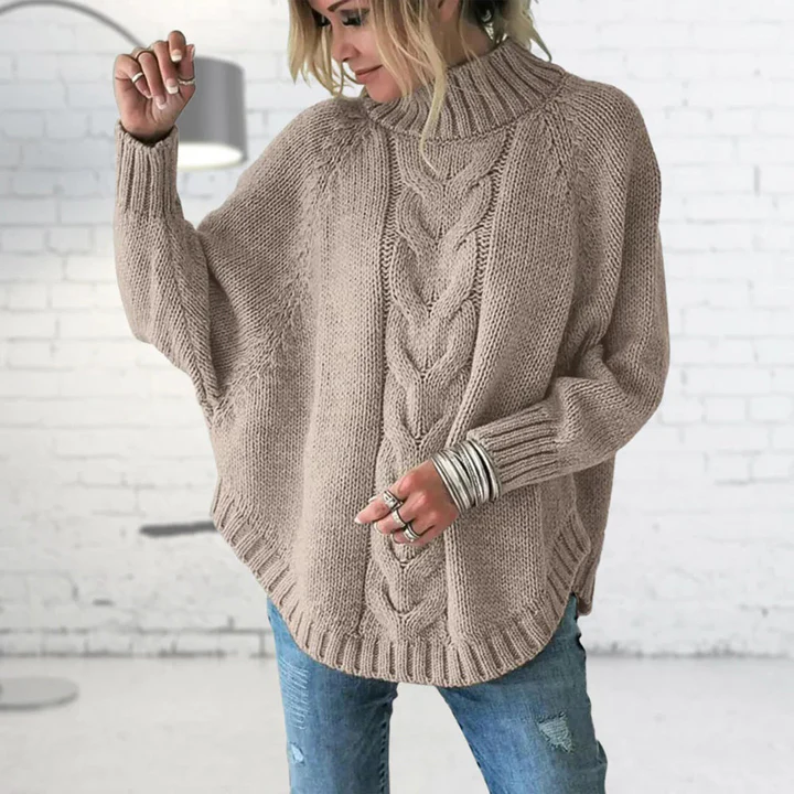 Women's oversized cable knit turtleneck sweater in wool blend with cozy chunky knit texture