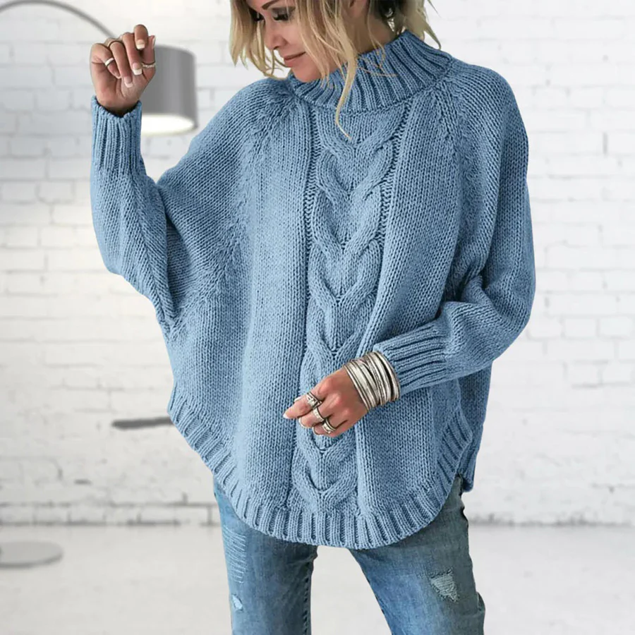 Women's oversized cable knit turtleneck sweater in wool blend with cozy chunky texture