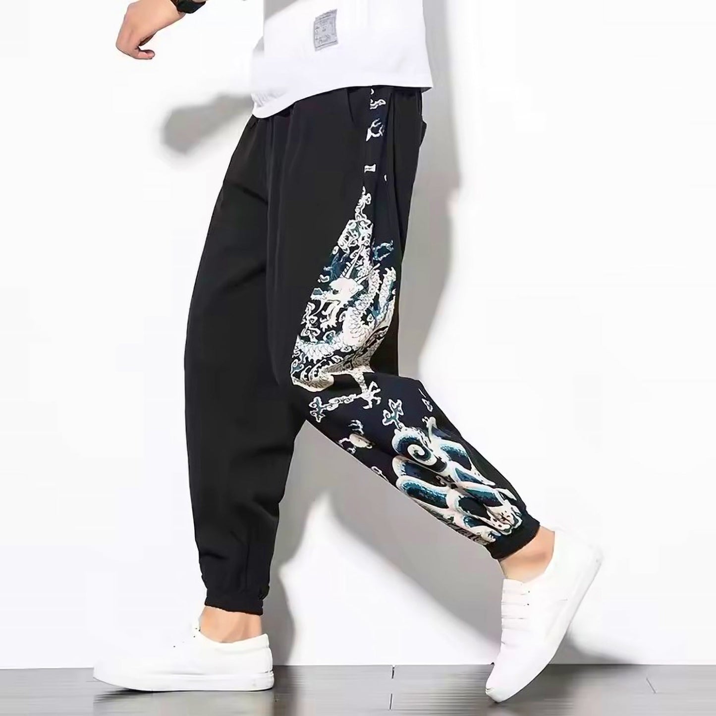 Black cotton-linen harem pants relaxed tapered fit with Japanese dragon artwork along the sides