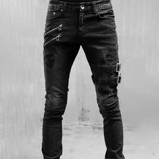 Men's slim fit distressed blue denim jeans with gothic buckle accents and zipper detail
