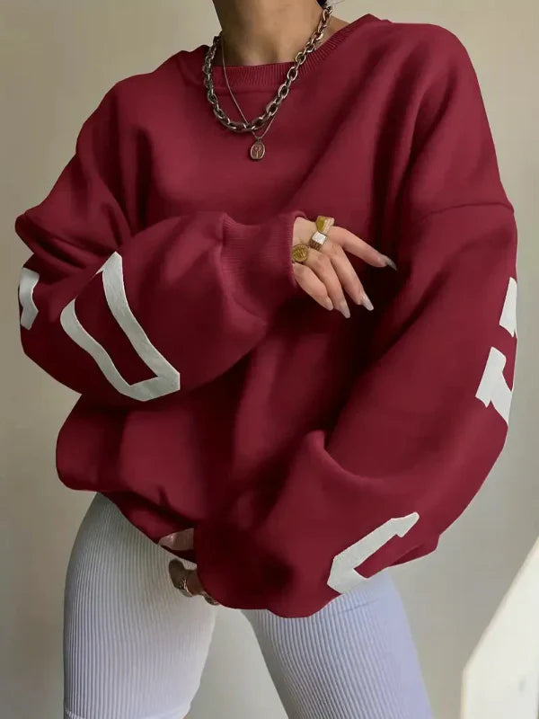 Women's oversized cotton blend sweatshirt with dropped shoulders and bold side print detail