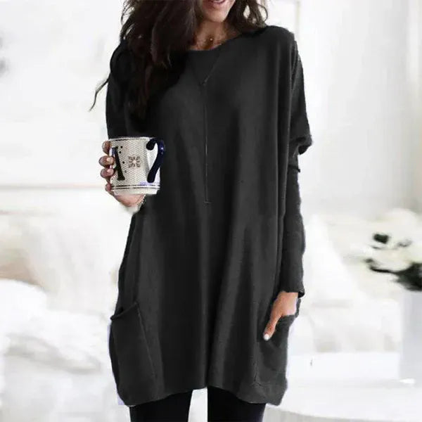 Women's oversized soft knit tunic pullover with dropped shoulders, relaxed fit, and side pockets