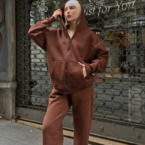 Women's oversized cotton hoodie lounge set in neutral tones with zip front and drawstring hood