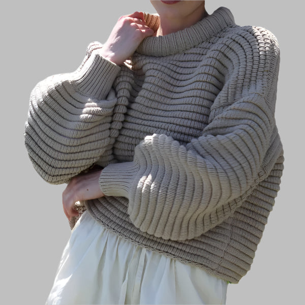 Women's oversized wool blend knit sweater with high collar and ribbed texture for a cozy fit