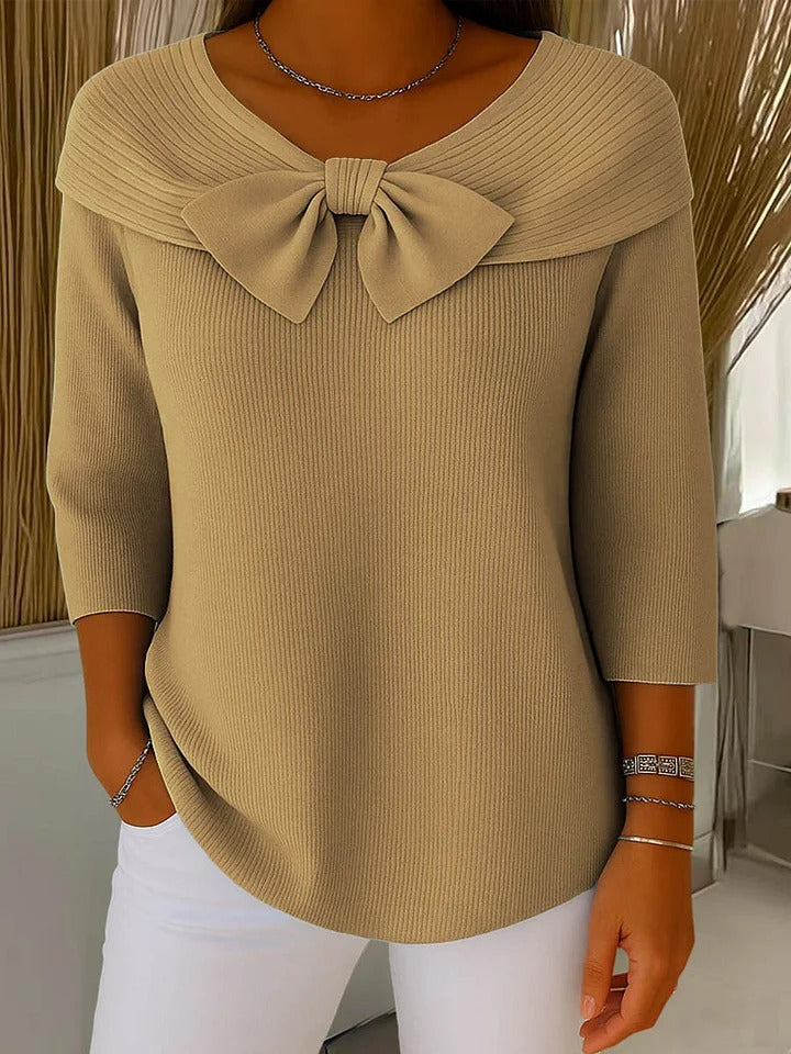 Women's round neckline sweater with delicate bow accent, soft breathable knit, feminine classic style