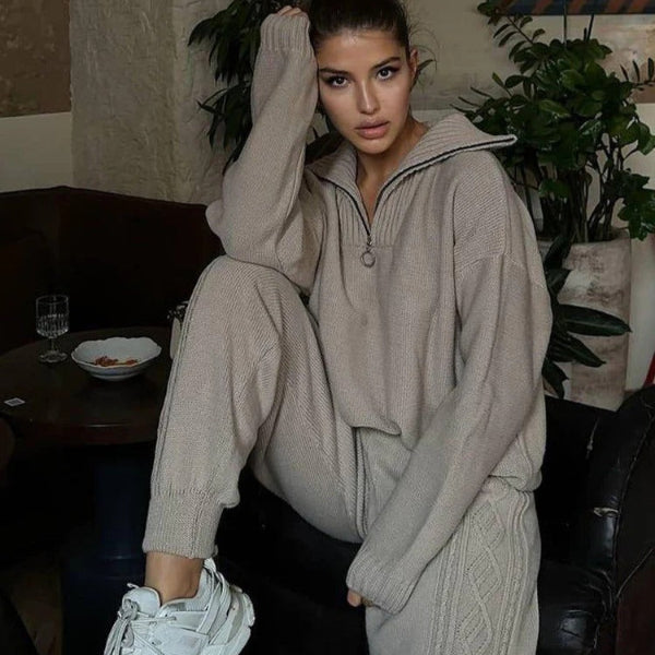 Women's oversized quarter-zip soft knit loungewear top with ribbed cuffs in neutral tones