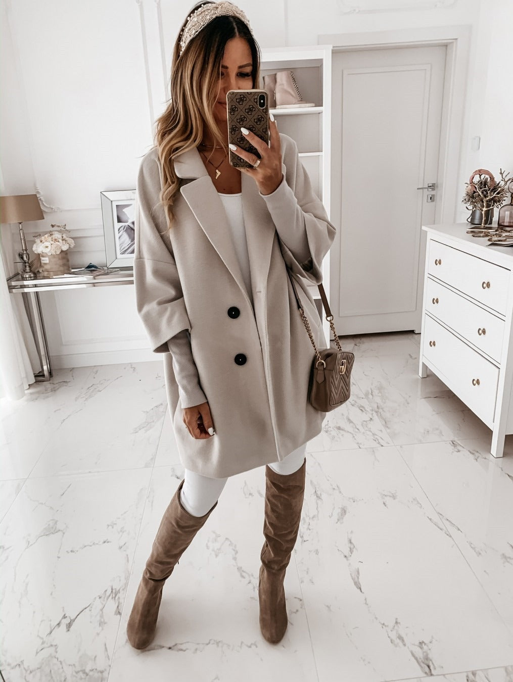 Women's oversized wool coat three-quarter sleeve lapel collar button-front chic winter style