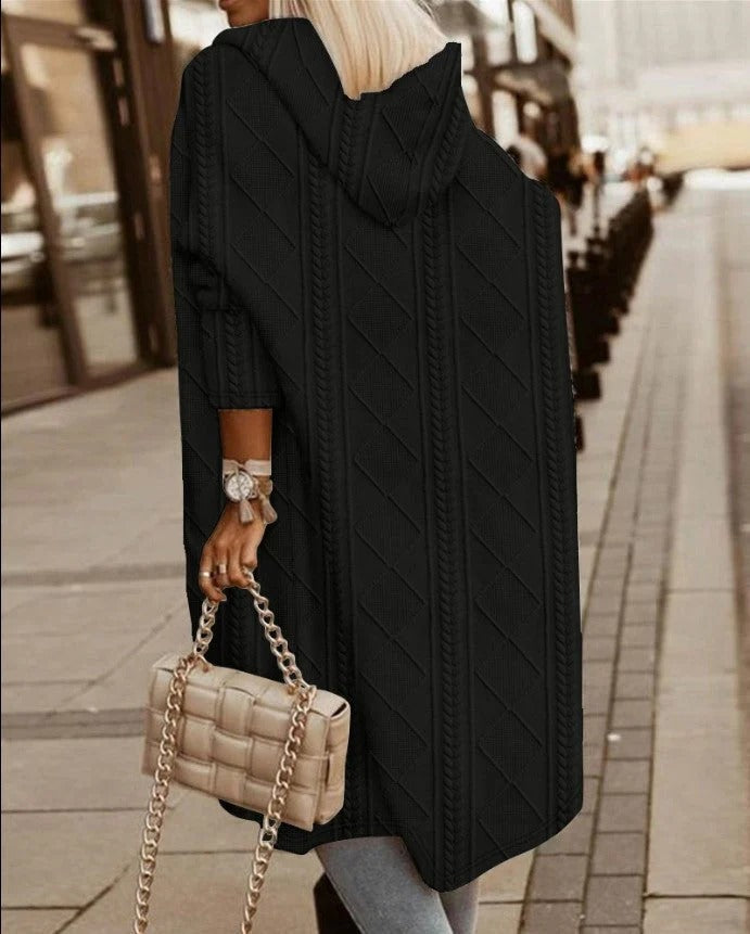 Women's oversized longline hooded cable knit cardigan in cozy wool blend, perfect for casual layering