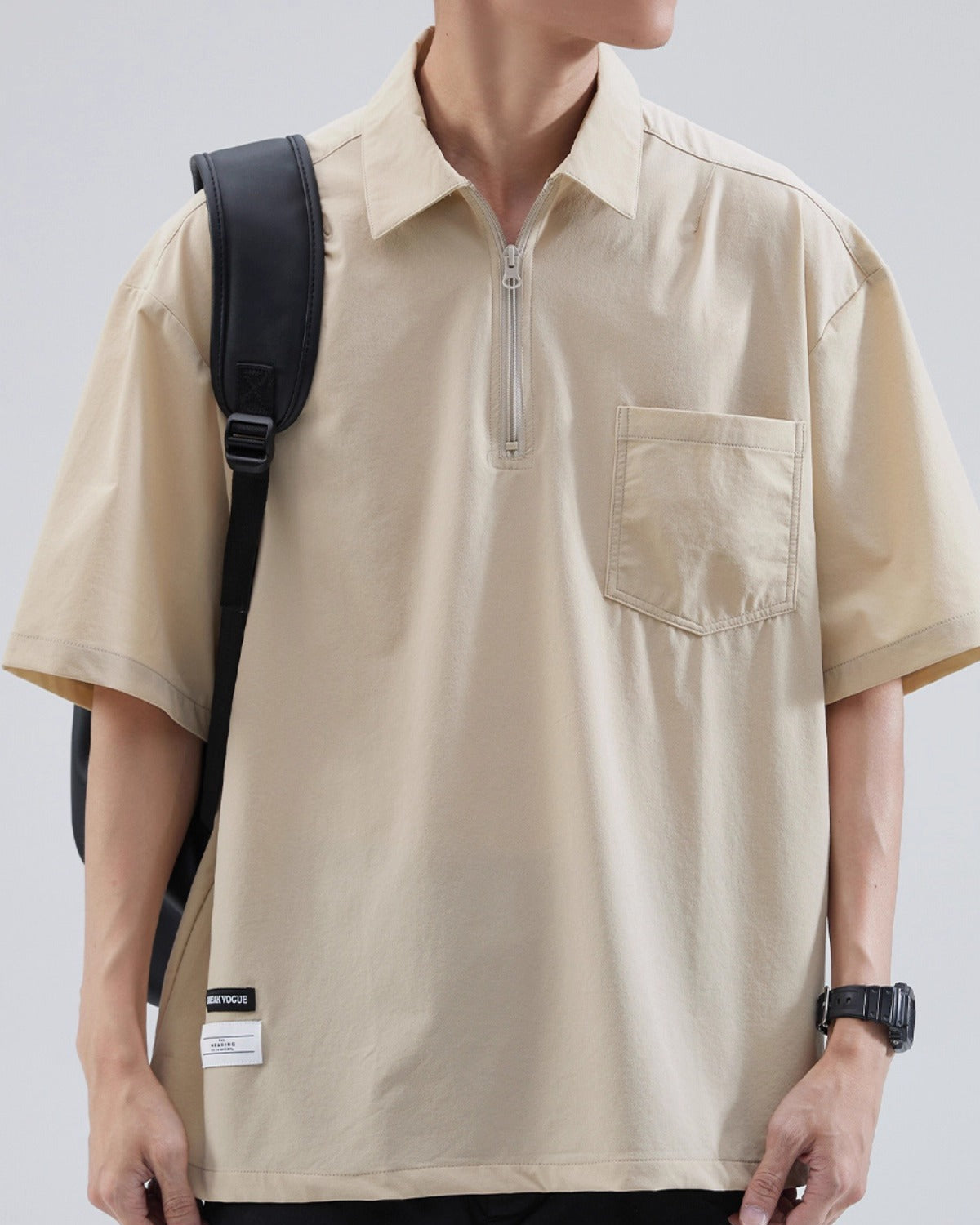 Oversized boxy polo shirt in ice silk with zipper detail, lightweight cooling fabric for summer