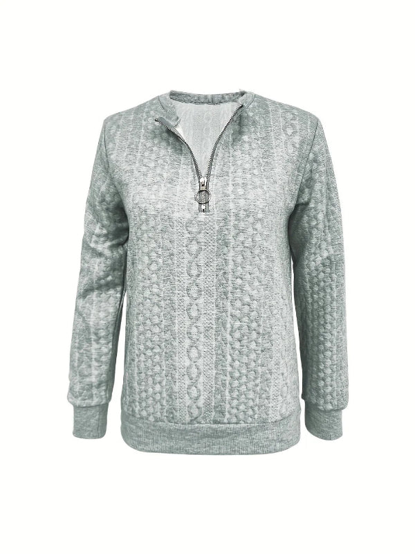 Women's beige relaxed-fit half-zip sweatshirt with cable knit texture and ribbed cuffs