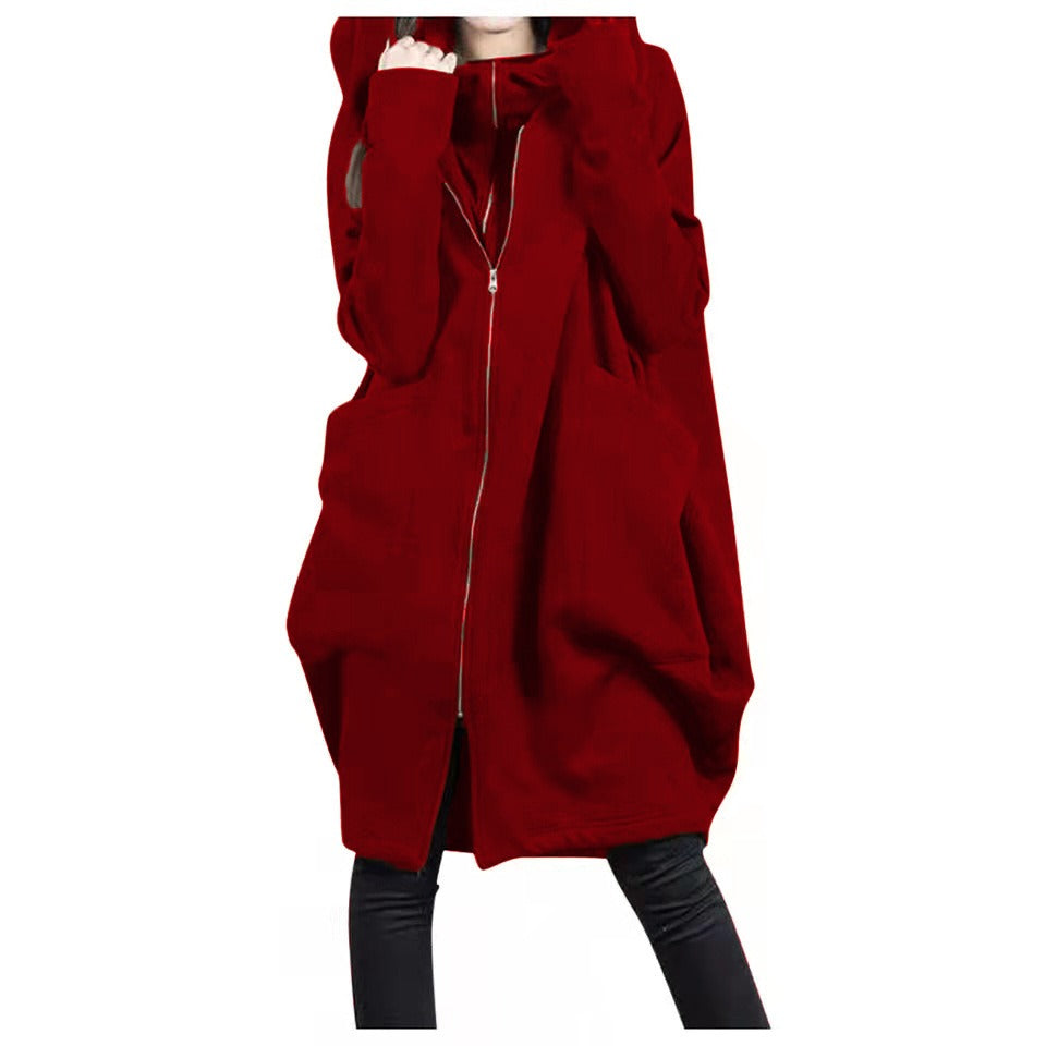 Women's oversized mid-length wool coat with hood, zip front pockets, relaxed silhouette for fall winter