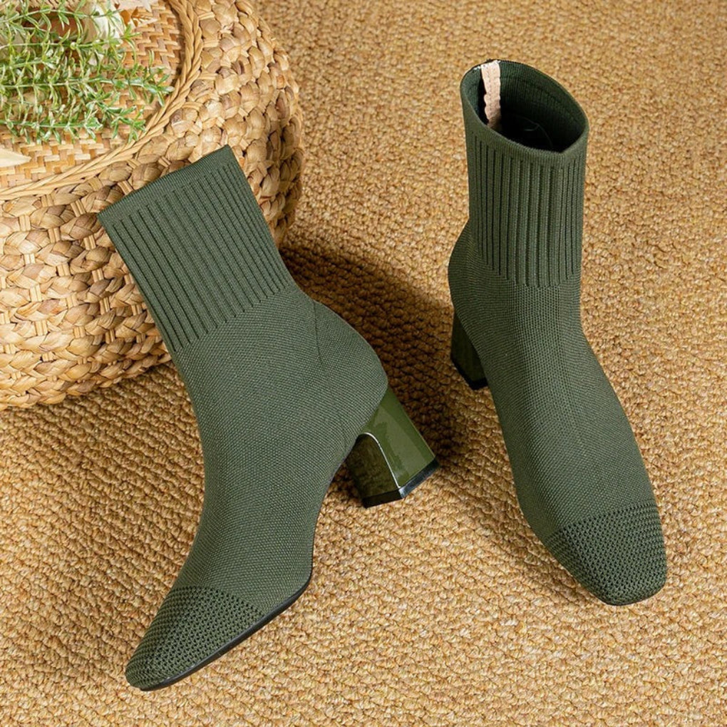 Women's ribbed knit ankle boots in winter style with stretchy textured upper and sleek silhouette