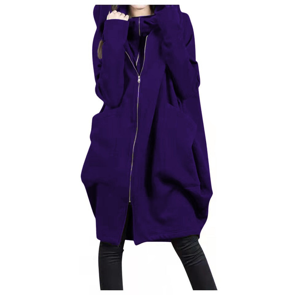 Women's oversized mid-length wool coat with hood, zip front pockets, relaxed silhouette for fall winter