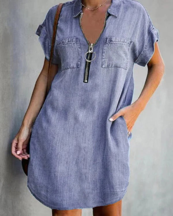 Women's relaxed-fit blue denim dress, short sleeve with front zipper closure and utility pockets