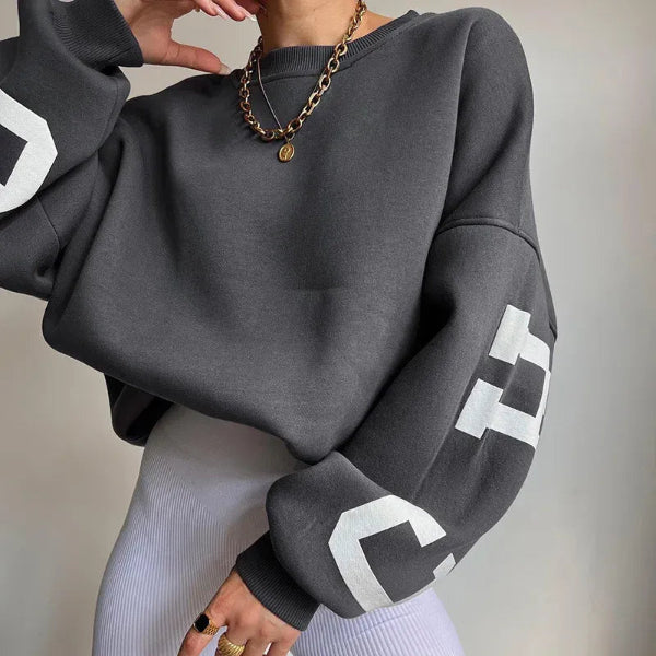 Women's oversized cotton blend sweatshirt with dropped shoulders and bold side print detail