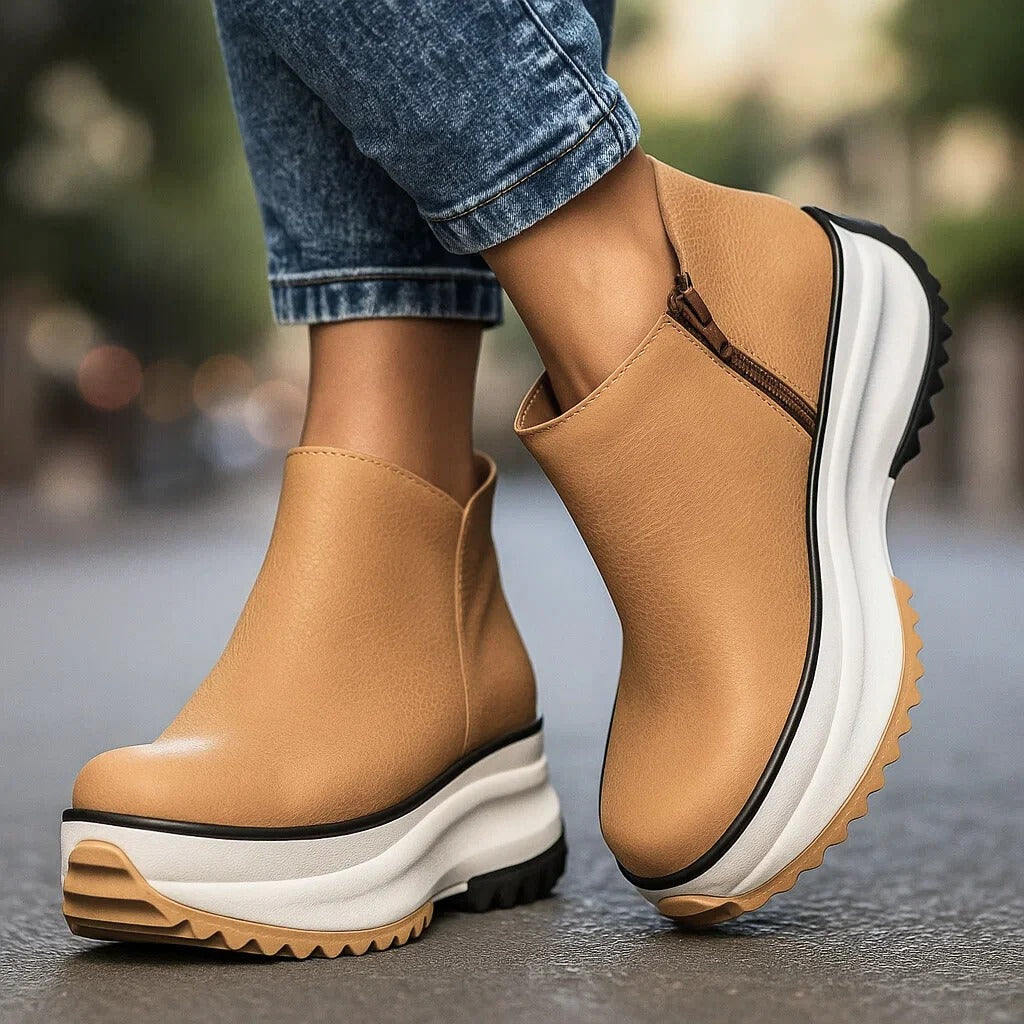 Cassien minimalist leather platform boots in neutral tone, sleek silhouette with elevated chunky sole