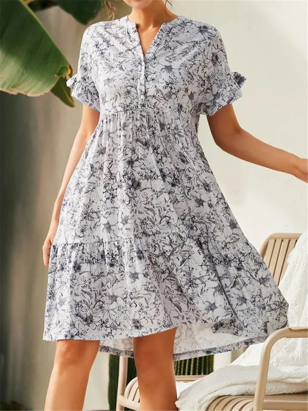 Women's floral A-line dress with V-neck, tiered skirt, ruffled sleeves in cotton blend