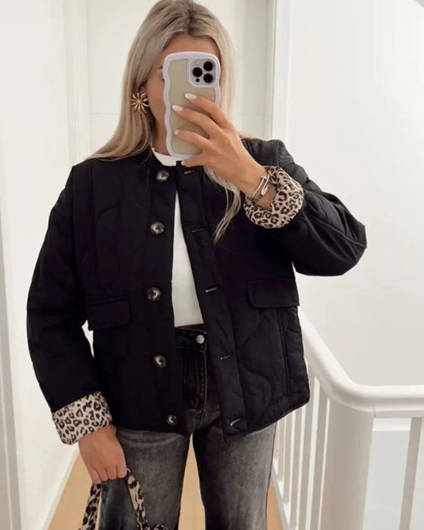 Women's relaxed fit quilted jacket with leopard cuff detail, button front, flap pockets