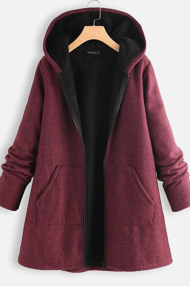 Women's oversized fleece-lined hooded coat, zipper front, mid-thigh length, relaxed winter silhouette
