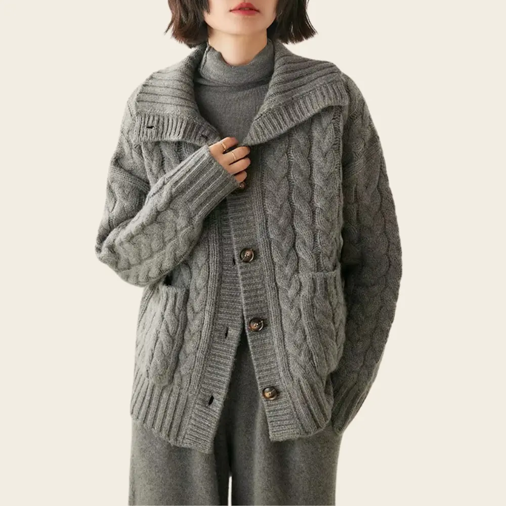 Heavyweight cable knit wool turtleneck cardigan in classic vintage style for cold weather