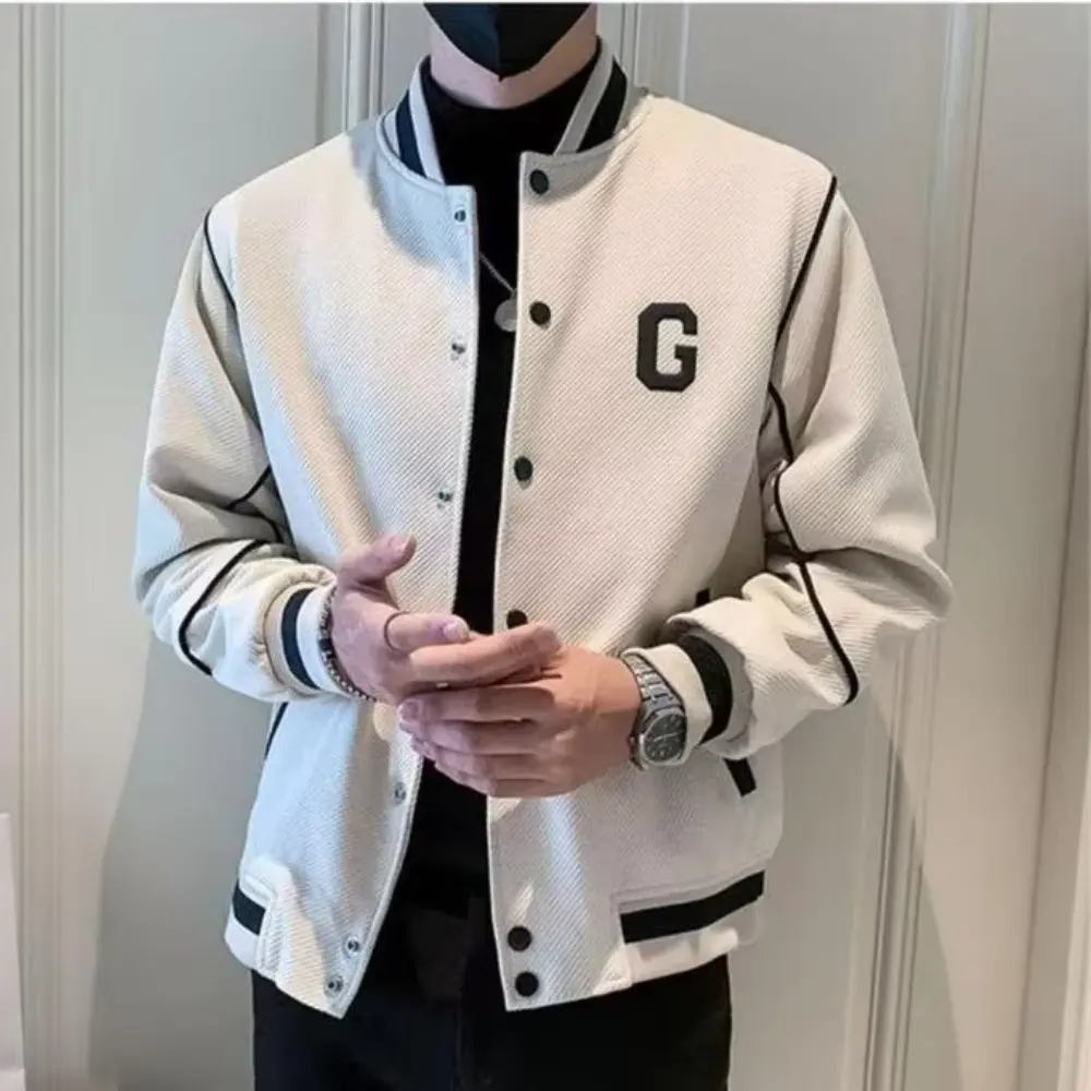 Black motorcycle varsity jacket with streetwear-inspired design, lightweight blend for spring and autumn layering
