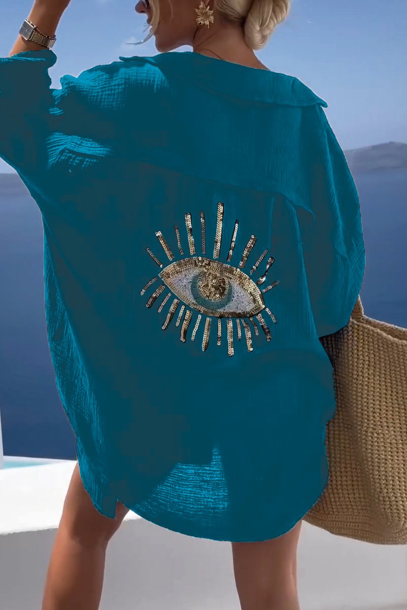 White oversized elegant blouse with relaxed silhouette and graceful draping for a polished chic look